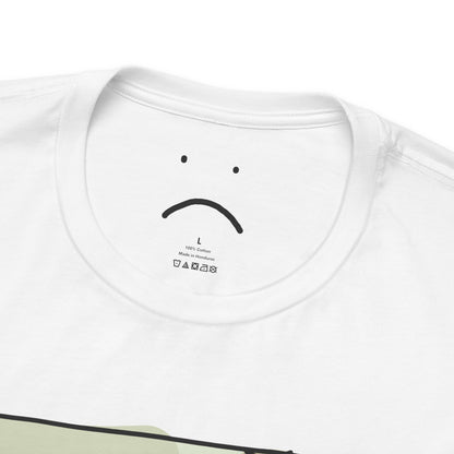 gorl with a cup on a bed deluxe tee