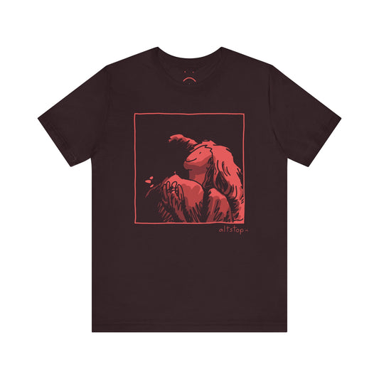 red girl hugging french guy deluxe tee